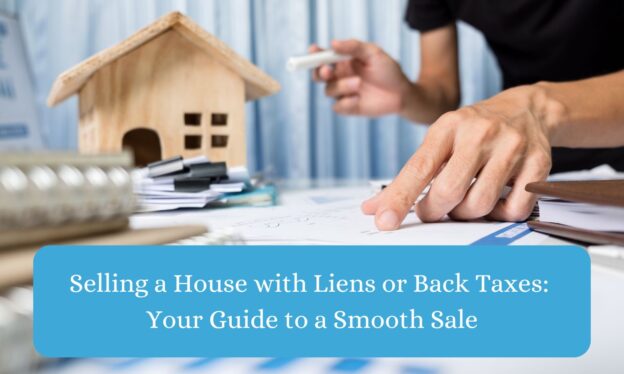 Person calculating a lien and back taxes with a small wooden house in the background.